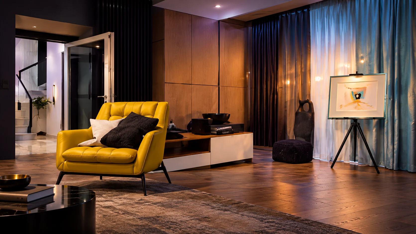Interface concept: indoor view with a yellow chair and painting on an easel